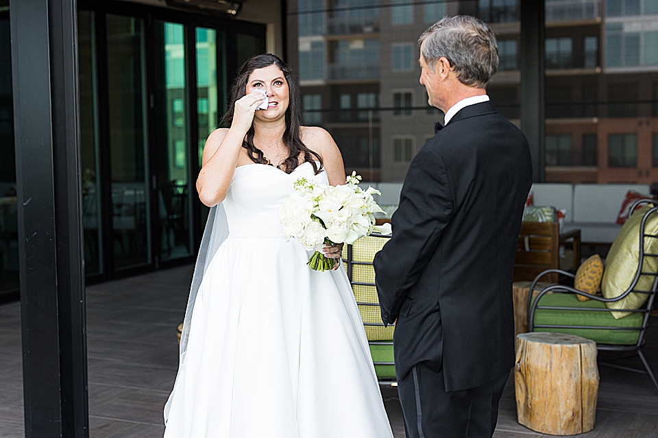 bride crying after seeing dad